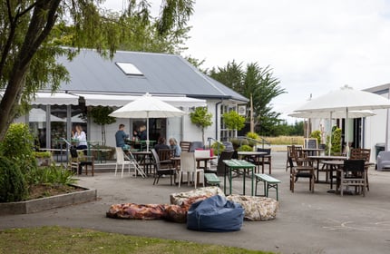 Outdoor seating area outside the cafe at the Old School Collective in North Canterbury.