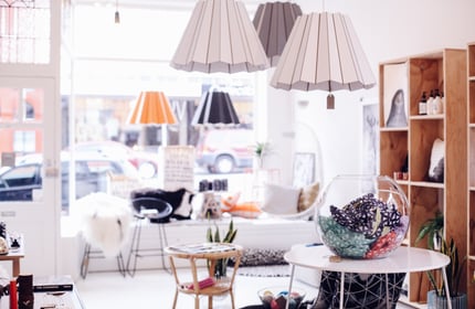 Interior of shop with hanging lights.