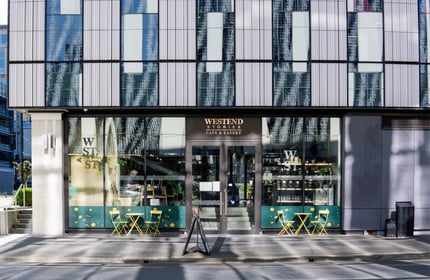 Exterior view of Westend Stories from the other side of the street.