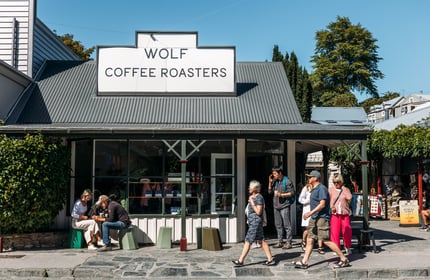 The exterior of the Wolf Coffee Roasters on a sunny day.