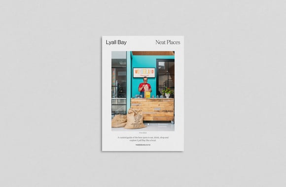 Front cover of the Lyall Bay pocket guide with Wonderland Chocolate on the cover.