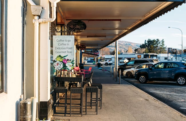 Seating out front of the The colourful interior of 103 The Store Roxburgh Central Otago on a sunny day.