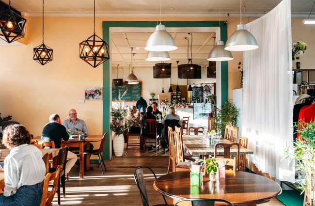 The cafe seating inside The colourful interior of 103 The Store Roxburgh Central Otago.