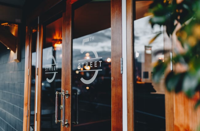 Close up of door signage outside 5th Street restaurant Christchurch.
