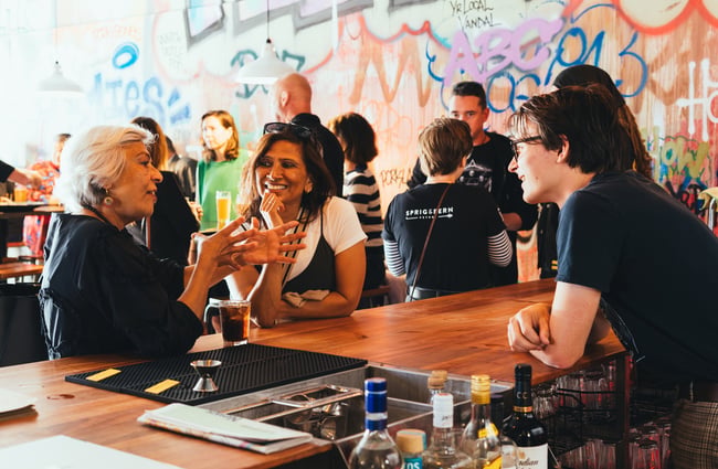 Patrons at the bar at Abandoned Taproom Petone.