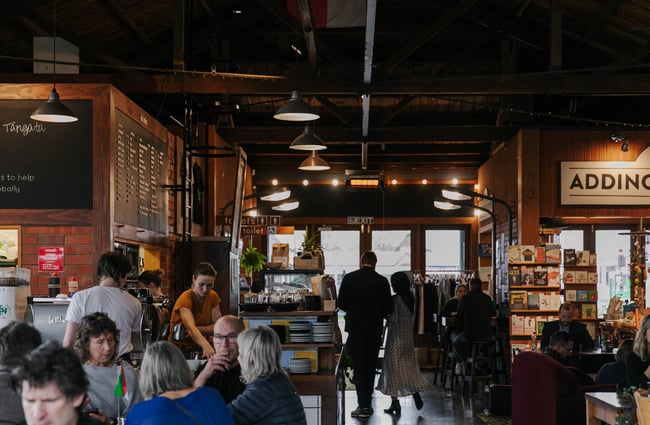 View of people walking across the cafe at Addington Coffee Co-op in Christchurch.
