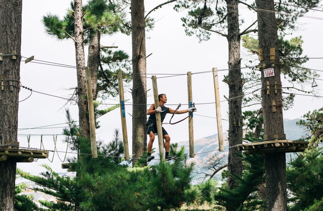 Person walking on rope.