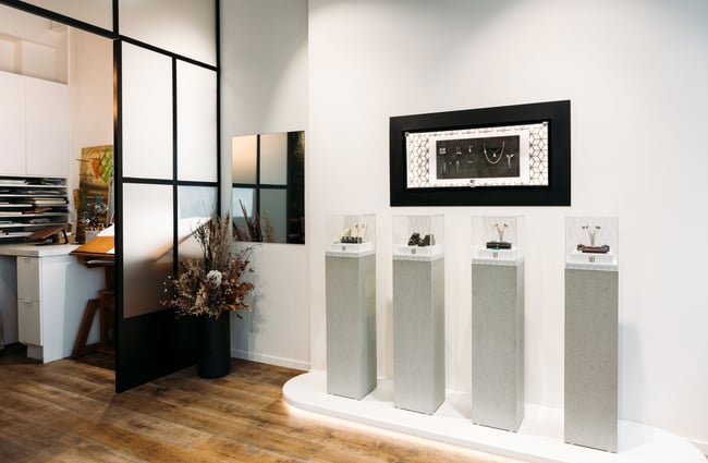 Plinths displaying diamond jewellery.