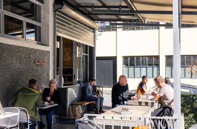 Outdoor porch seating area at Allpress Auckland Roastery