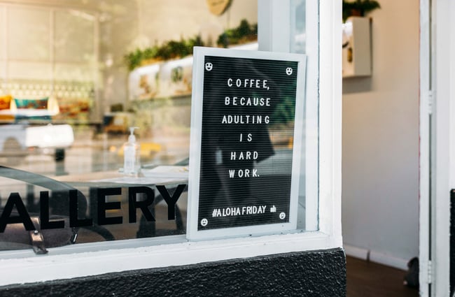 Blackboard in the window at Aloha Friday, Porirua.