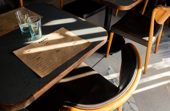 A close up of a table setting at Amano.