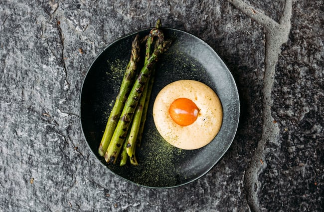 Birds eye of an asparagus, hollandaise and egg yolk dish at arc, Wānaka.