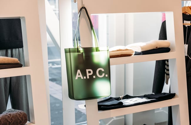 A close up of a green APC bag inside Area51 in Wellington.