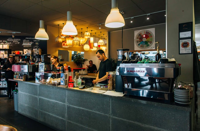 Staff standing behind the counter.