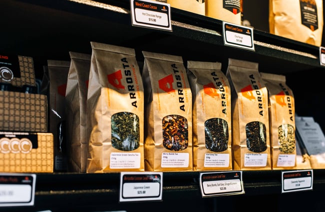 Close up of brown bags filled with teas.