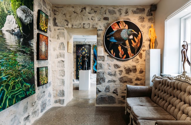 Interior view of the gallery and artwork at Artbay Gallery in Queenstown.