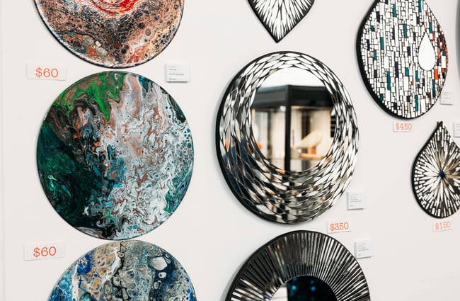 Art pieces on the wall at Artel Gallery & Store.