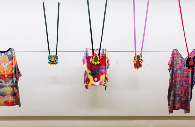 Art hangs on display at ArtsPost Gallery and Shop Hamilton.