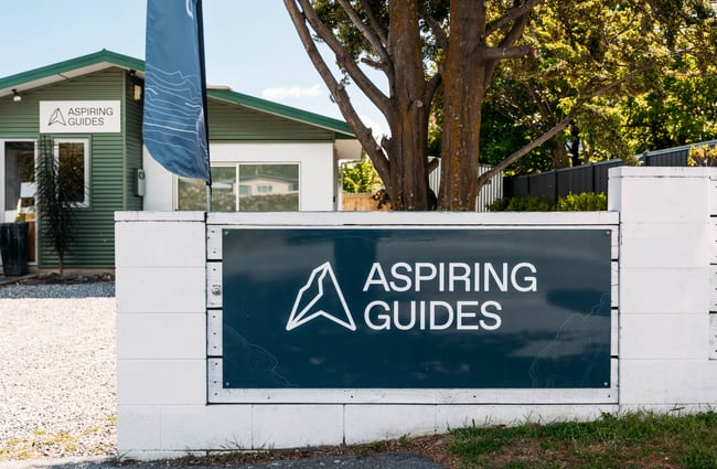 Aspiring Guides signage outside the building.