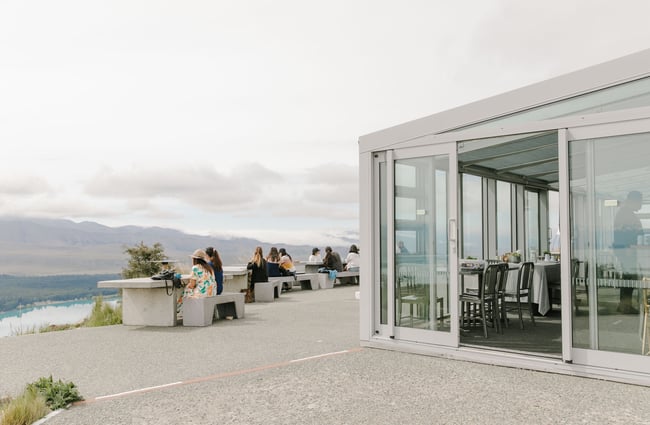 Customers sitting on outside tables at Astro Cafe, Tekapo.