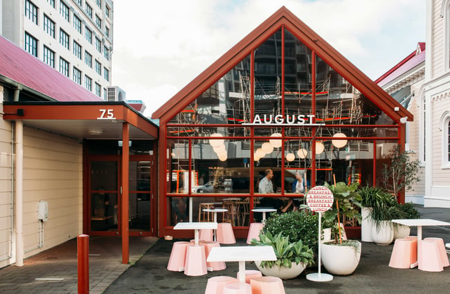 The red and glass exterior of August Eatery.