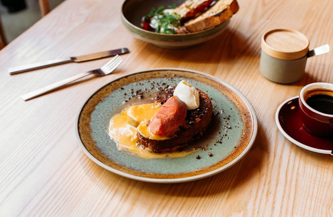 A close up of French toast on a plate.