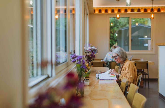 Customer reading at Augustines of Portobello.