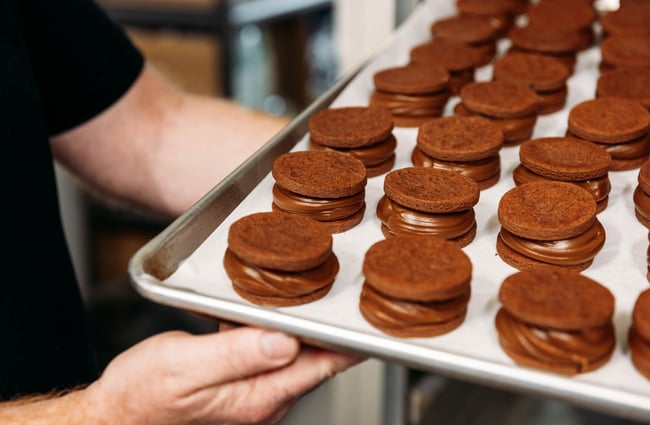Tray of chocolate cookies at Aurora Argentinian Bakery.