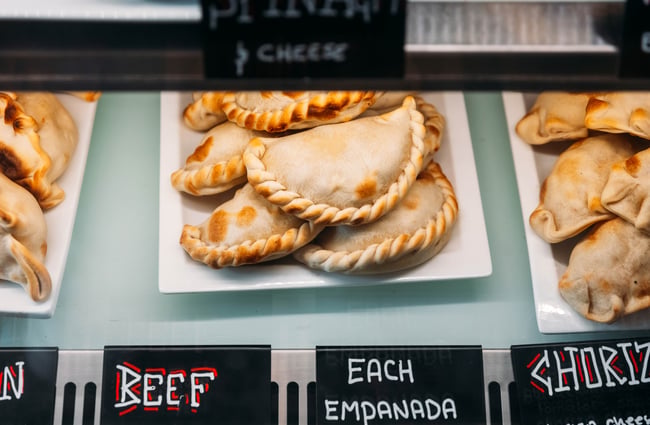 Empanadas in the cabinet at Aurora Argentinian Bakery.