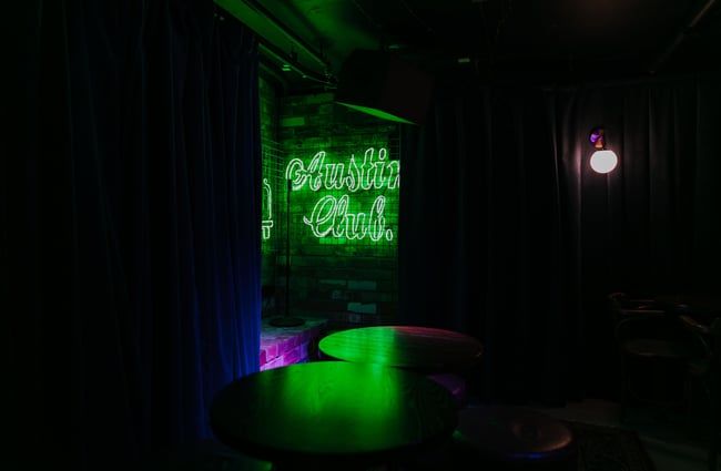 Austin Club green neon sign.