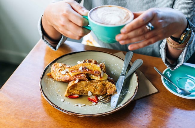 Coffee and brunch on a table.