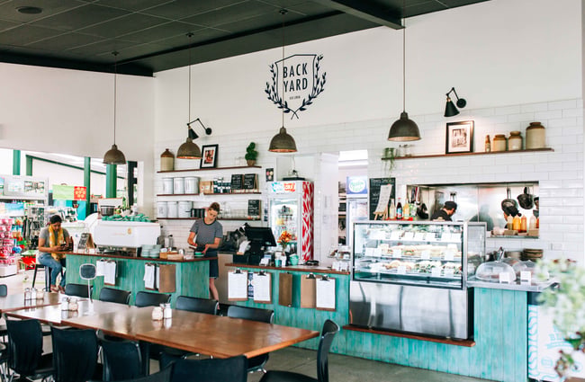 Bright green counter and white wall serving area.