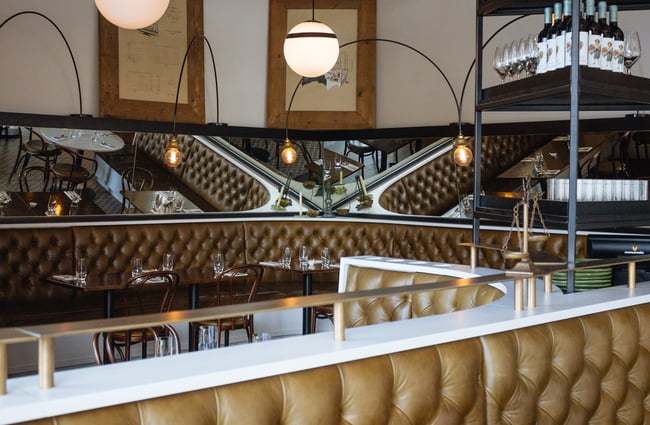 Interior of cafe by mirrors.