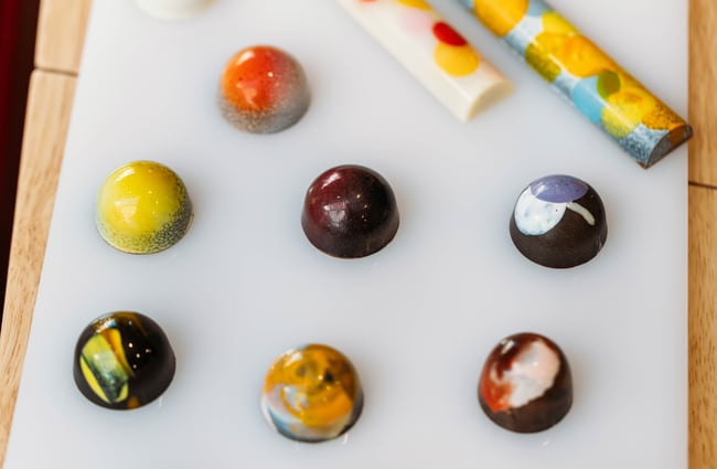Small chocolates on a counter.