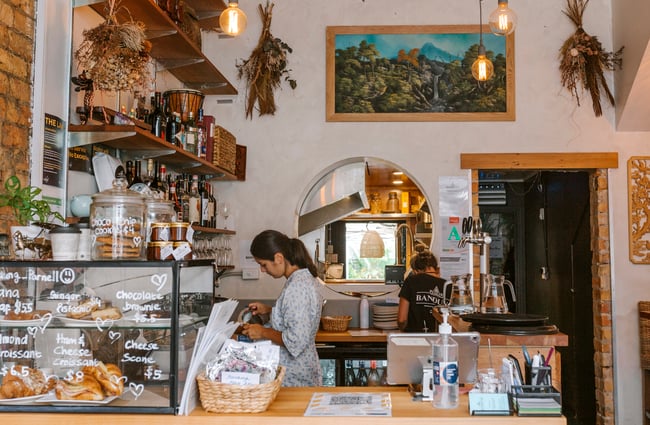 Staff working behind the counter at Bandung Café, Auckland.