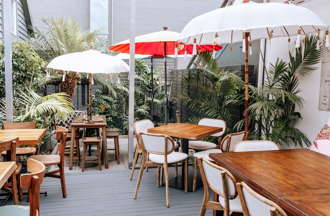 View of outdoor seating area at Bandung Café, Auckland.