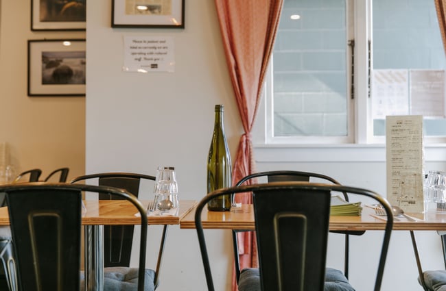 A close up of a table and chairs.