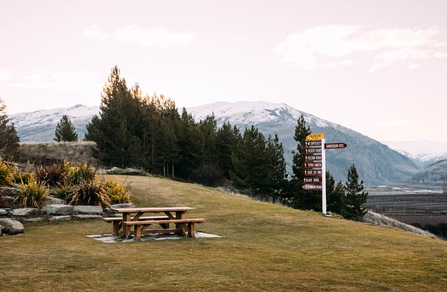 A view of the mountains in An outdoor table seating in Bannockburn Central Otago.