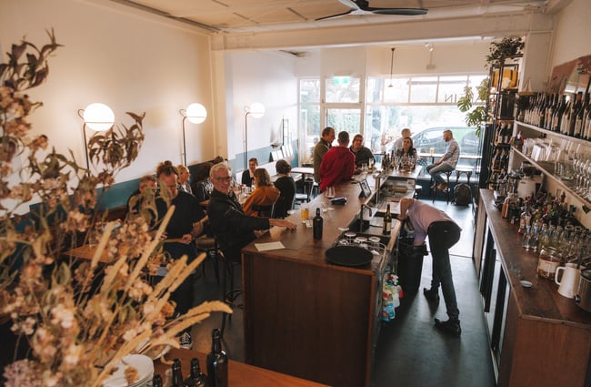 Birdseye view of busy Bar Martin with lots of customers.