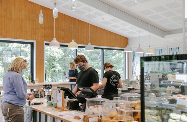 Customer being served at the counter at Barker's Foodstore and Eatery, Geraldine.