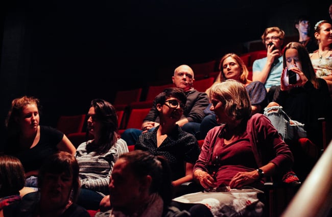 People in the theatre.