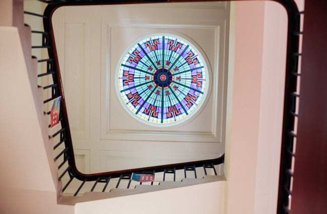 Looking up at the ceiling.