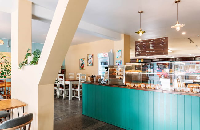 Turquoise-coloured counter area at Belen Plant Bakery in Petone