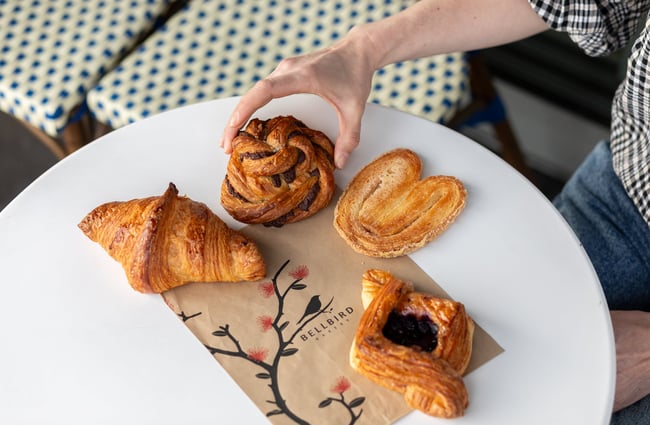 Selection of pastries on the table at Bellbird Bakery Holmwood.