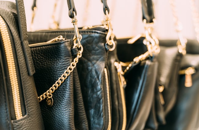 Close up of black Deadly Ponies handbags for sale at Belle Bird Boutique.