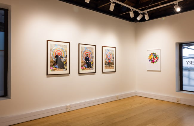 Framed works of art on walls.
