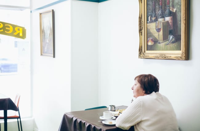 Woman at a table.