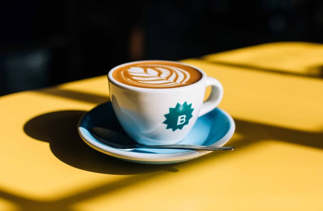 Close up of flat white on a table at Bestie.