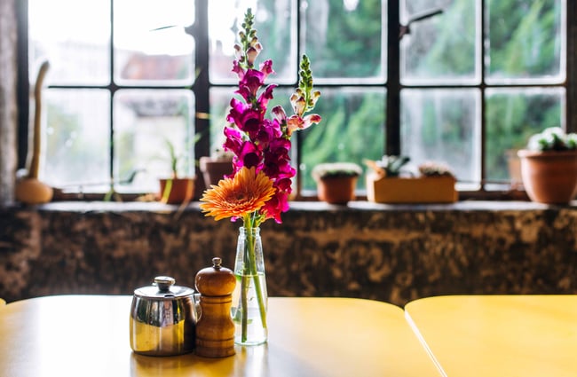 Vase of flowers on the table at Bestie.