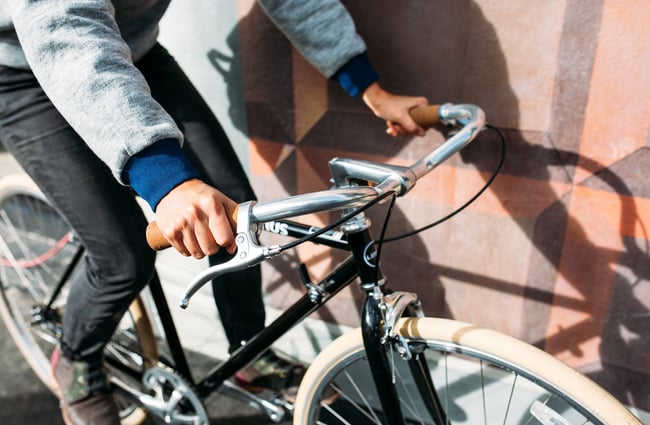 Close up of a woman on a bike.